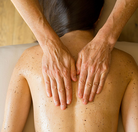 woman receiving a back massage