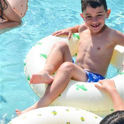 Kid in a pool float
